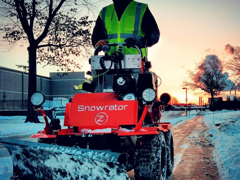 Dedicated sidewalk machine clearing a walkway